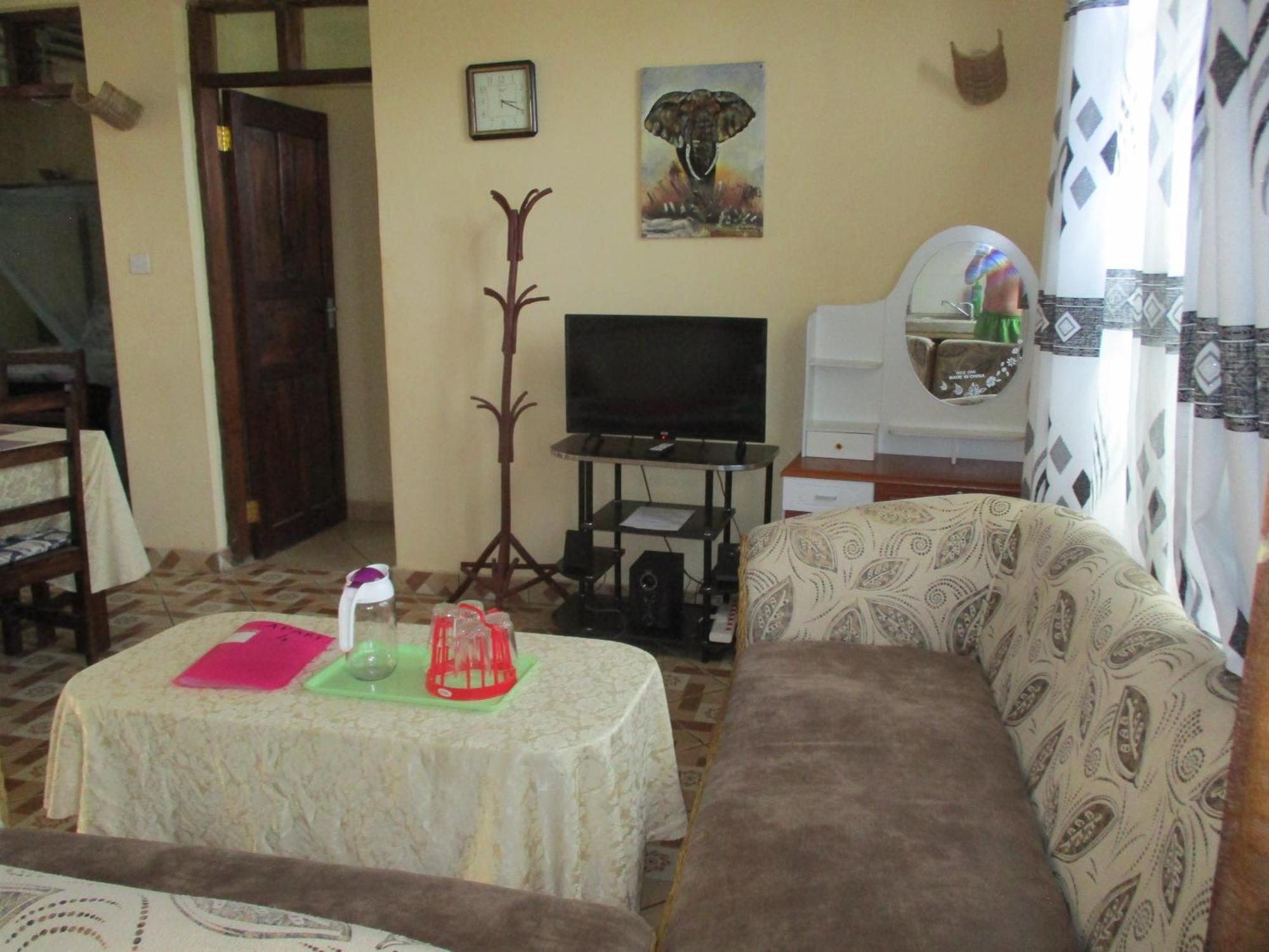 Simba Apartments Diani Beach Værelse billede
