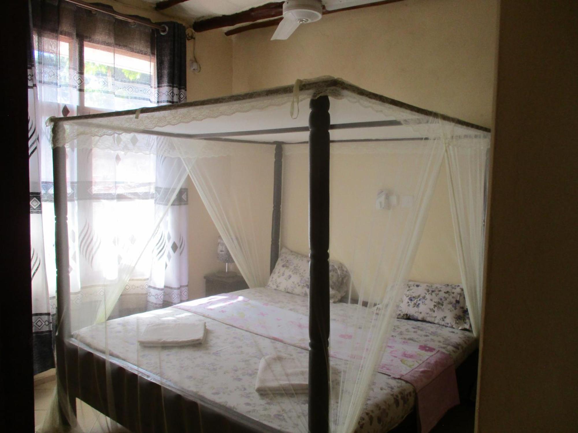 Simba Apartments Diani Beach Værelse billede
