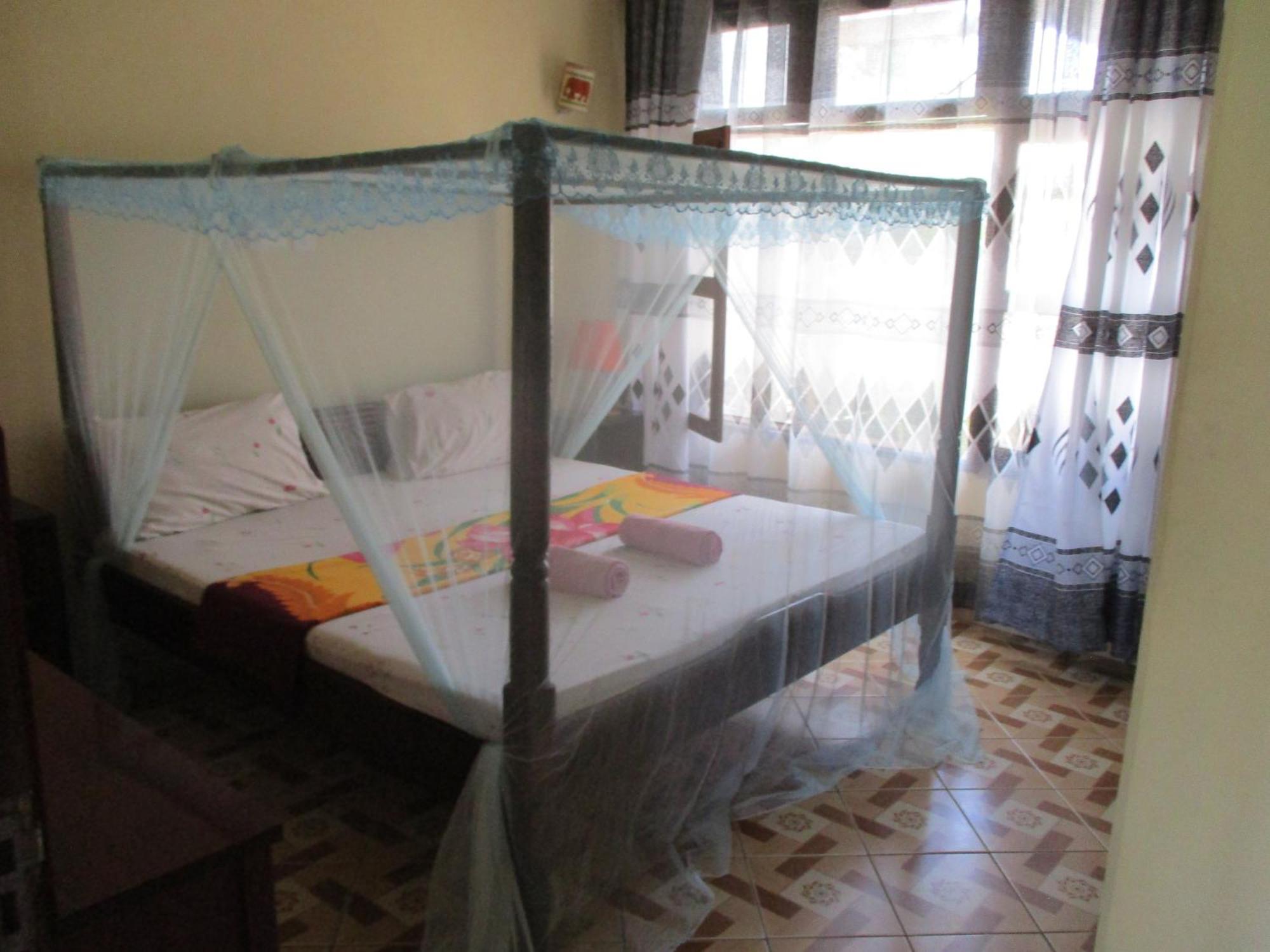 Simba Apartments Diani Beach Værelse billede