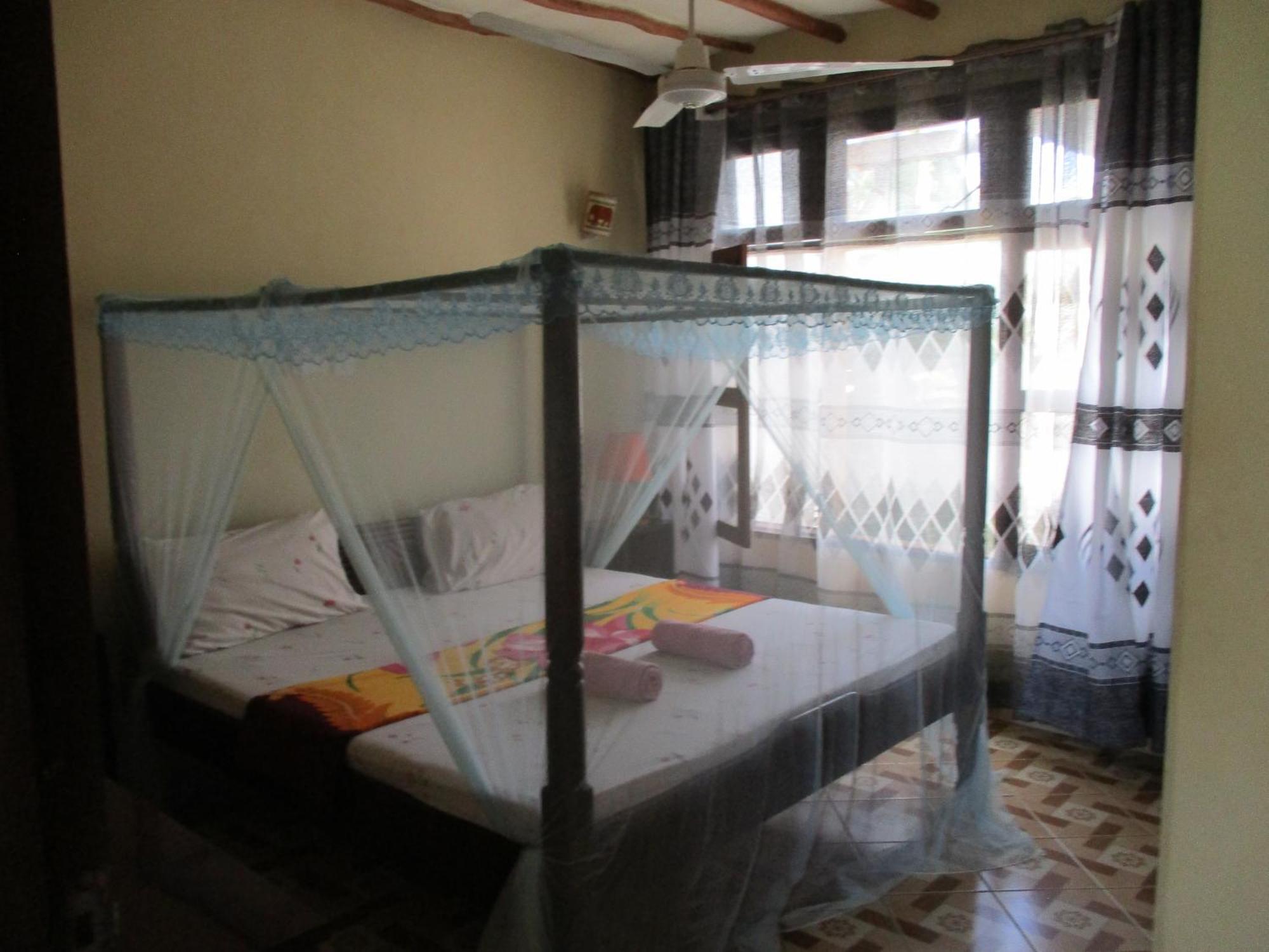 Simba Apartments Diani Beach Værelse billede